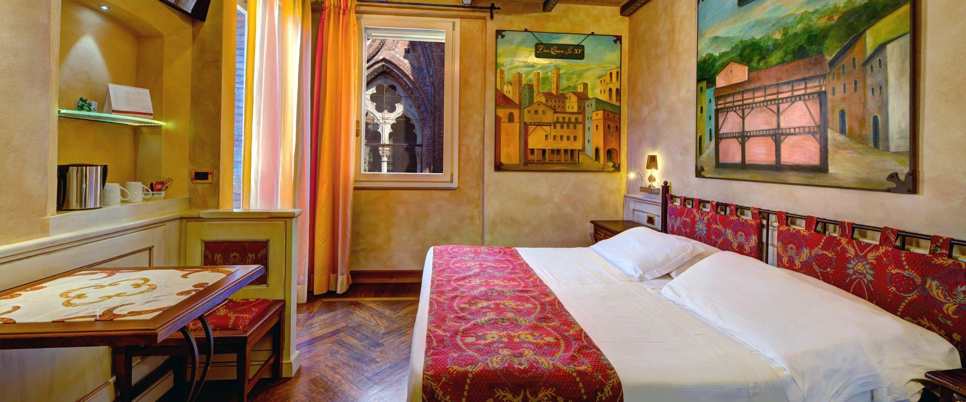 THE ALMA MATER AND THE ART HOTEL COMMERCIANTI: TWO STORIES THAT INTERTWINE Art Hotel Commercianti болонье THE ALMA MATER AND THE ART HOTEL COMMERCIANTI: TWO STORIES THAT INTERTWINE Art Hotel Commercianti болонье